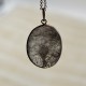 Colgante oval Cristal de roca inclusión Turmalina negra y plata