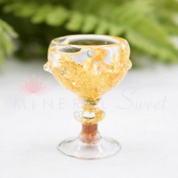 Paillettes d'or en bouteille