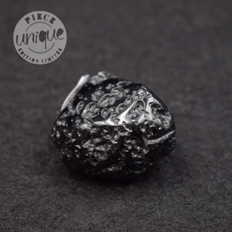 Grande tectite roulée 1