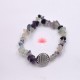 Fluorita pulsera barroca con flor de vida
