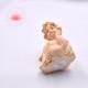 Ángel sentado en resina 3